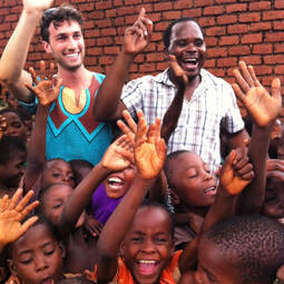 Kyle Horne and Davie Willard in a Malawian village